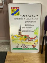 panneau entrée de village